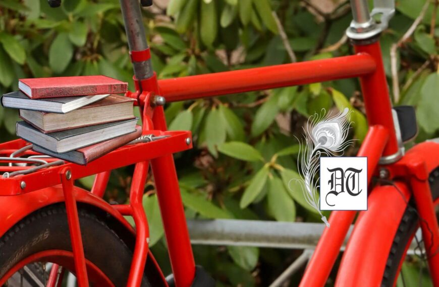 Father-Daughter Love: Riding Through Life with Red Symbols of Support